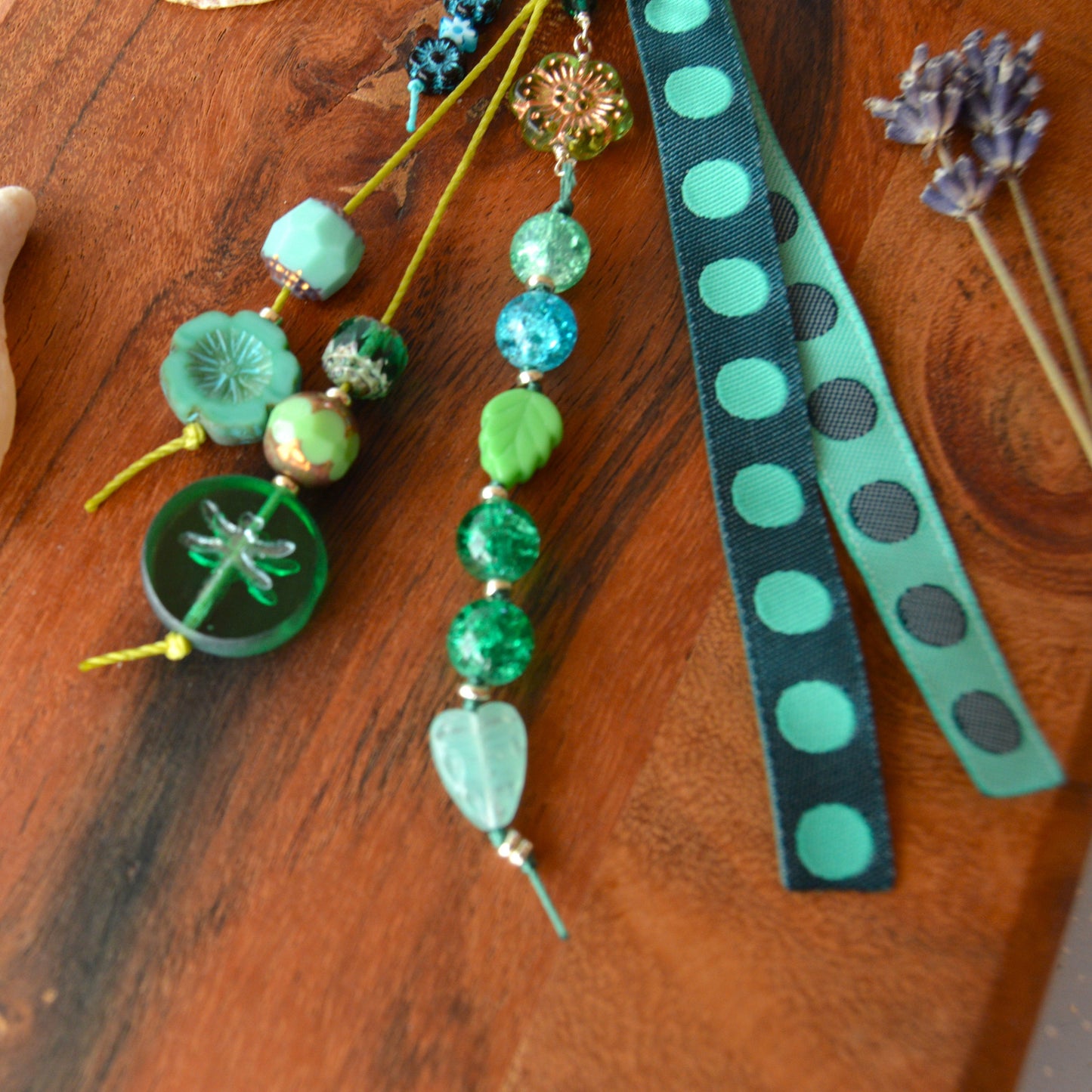 Handbag charm with Czech beads and ribbon in green and blue tones.