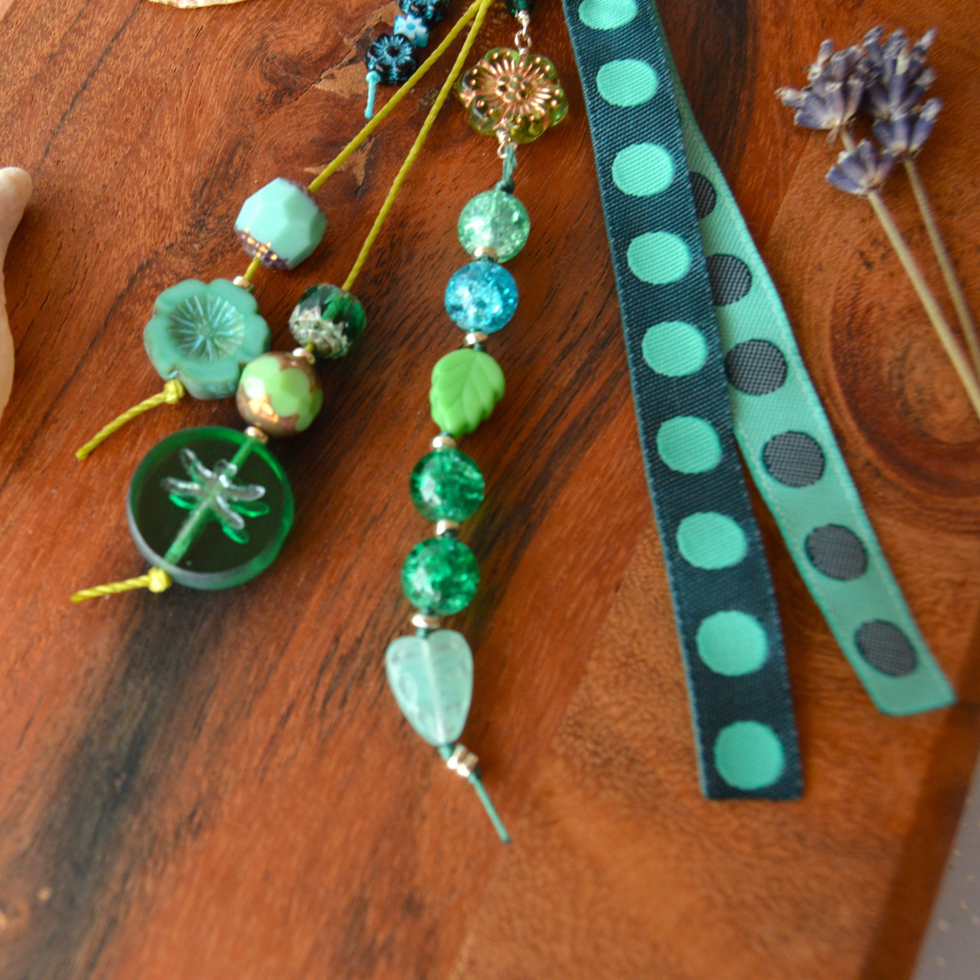 Handbag charm with Czech beads and ribbon in green and blue tones.