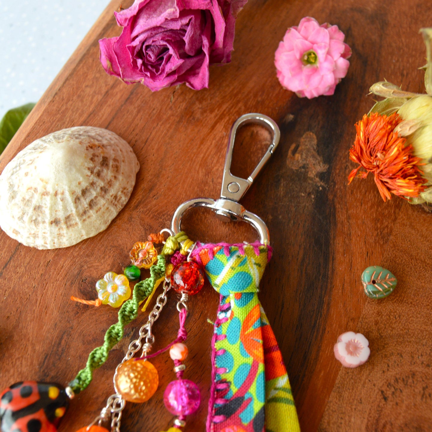 One of a kind colourful bag charm with ladybag, fruit- og flower glass beads.