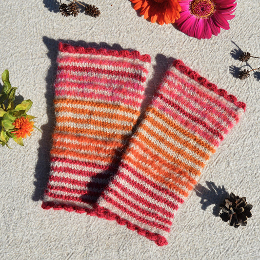 Striped and colourful knitted pulse warmers in alpaca wool.