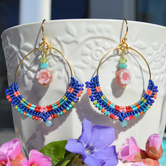 Colourful gold-plated sterling silver hoop earring decorated with micro macrame, Japanese seed beads, and amazonite gemstone. Czech glass flower charm with turquoise and olivine gemstones.