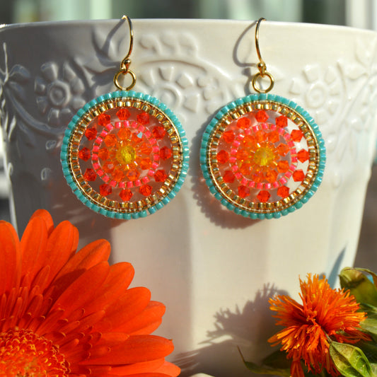 Gold-plated sterling silver earrings woven with Czech glass crystals and Japanese seed beads.