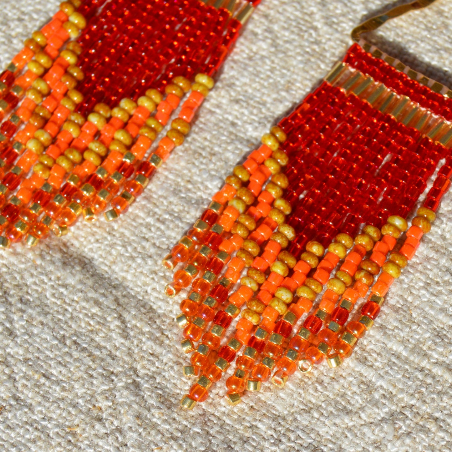 Small fringe earrings Closer to the Sun. Gold-plated sterling silver hammered triangle and ear-wire.