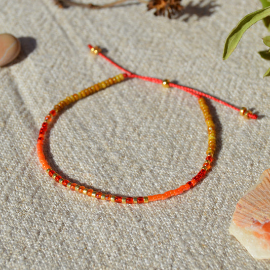 Adjustable seed beads bracelet with silicone stopper bead in gold-plated sterling silver. Nature inspired bracelet Closer to the Sun.