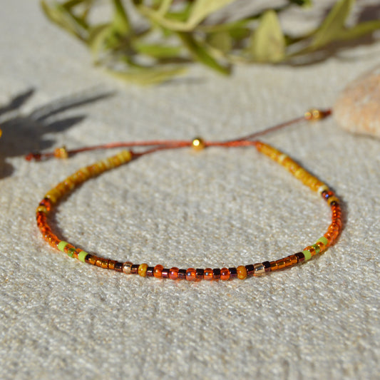 Adjustable seed beads bracelet with silicone stopper bead in gold-plated sterling silver. Nature inspired bracelet Closer to the Earth.
